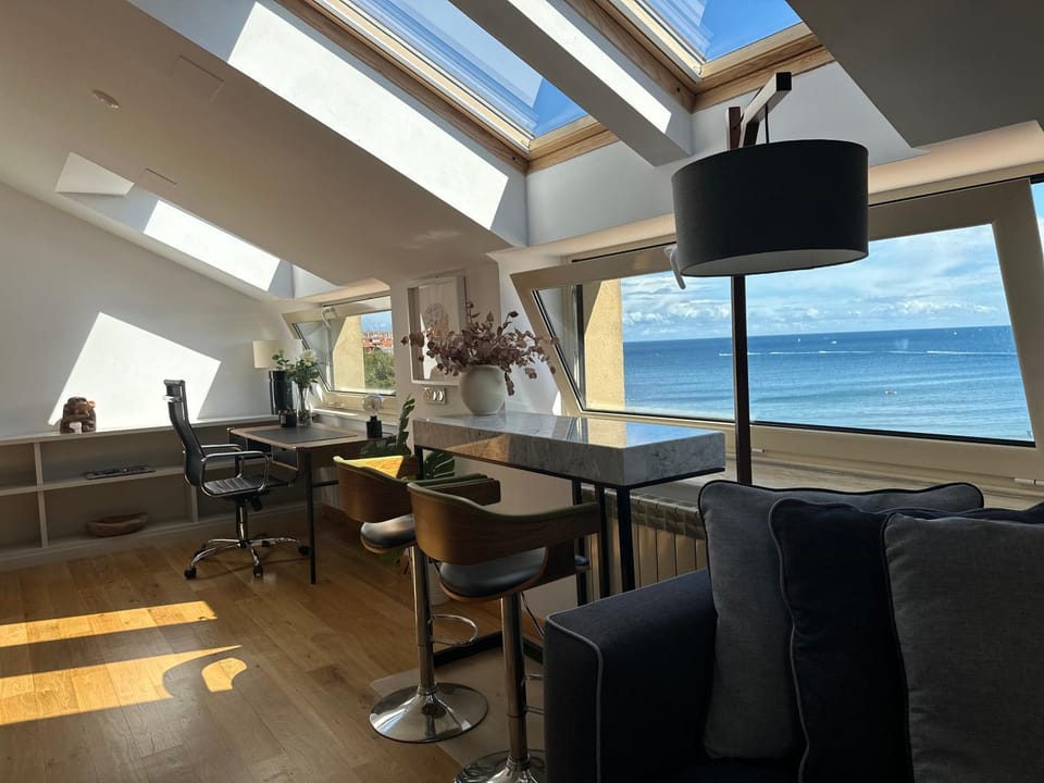 Natural landscape, Living room, Seating area, Dining area, Sea view