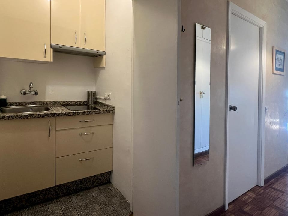 Kitchen or kitchenette, stove