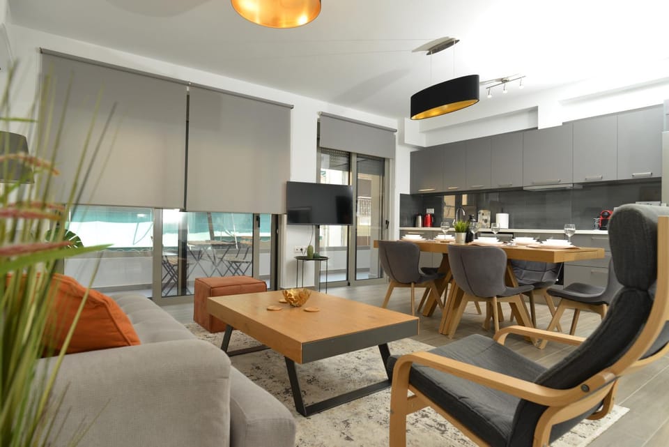 Kitchen or kitchenette, Living room, Seating area, Dining area
