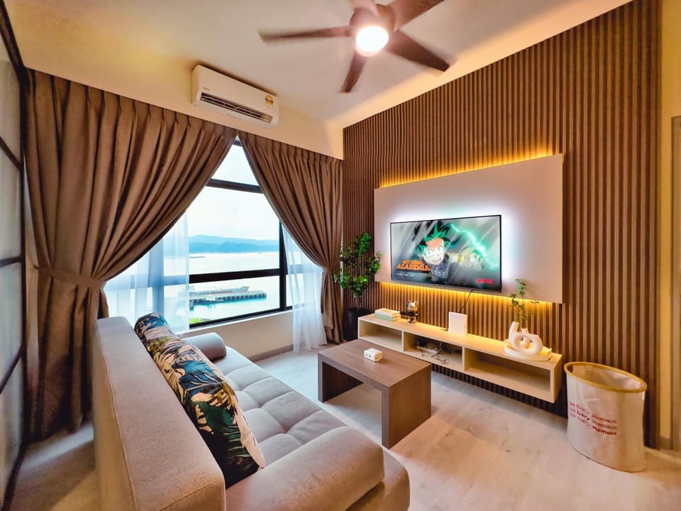 Communal lounge/ TV room, Natural landscape, TV and multimedia, Living room, Seating area, Evening entertainment, Sea view, fireplace, air conditioner