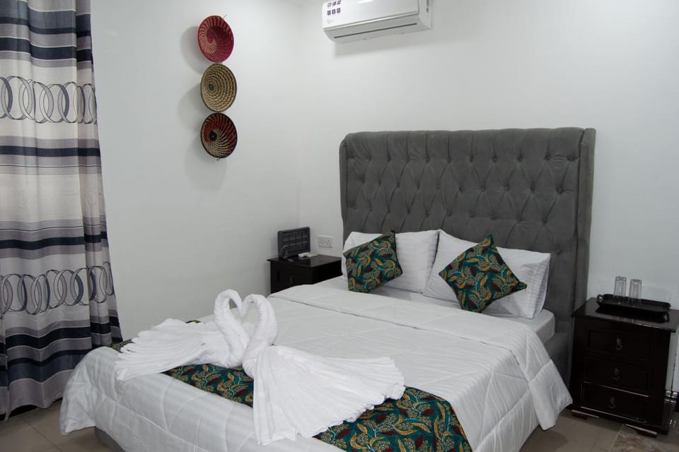 Bed, Photo of the whole room, Bedroom, towels, air conditioner