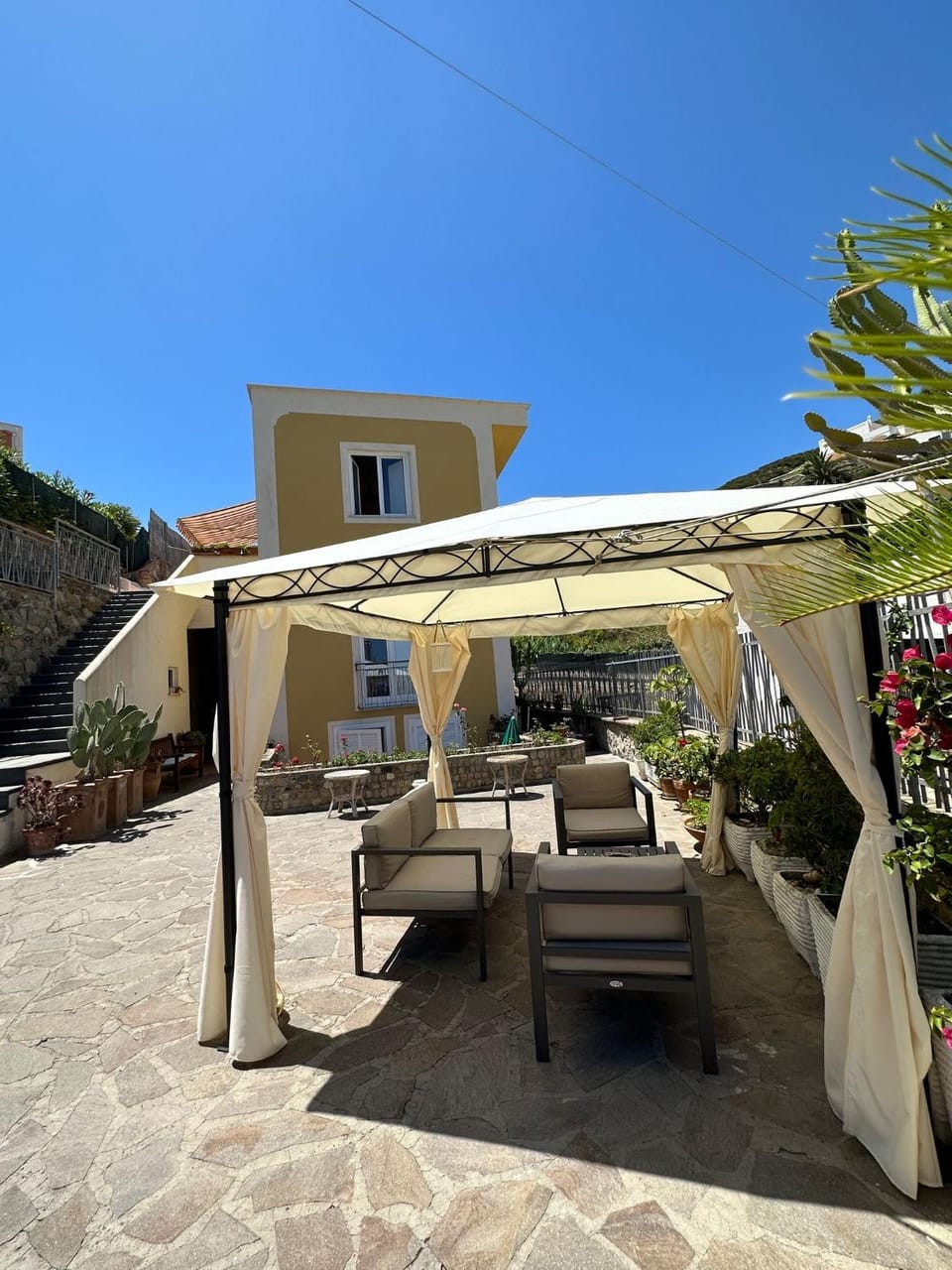 Property building, Patio, Day, Natural landscape, View (from property/room), Balcony/Terrace, Dining area, sunbed