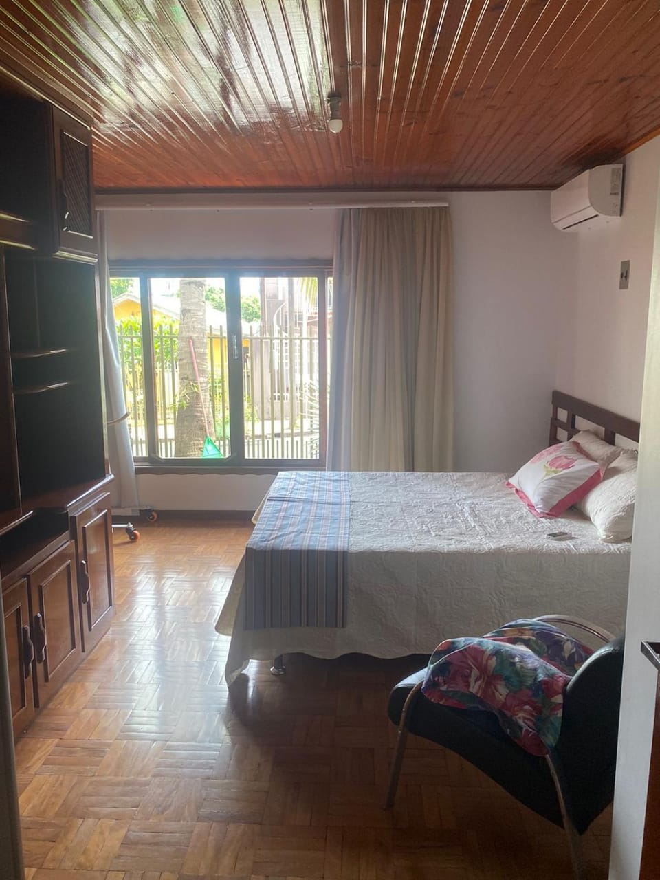 Photo of the whole room, wardrobe, air conditioner