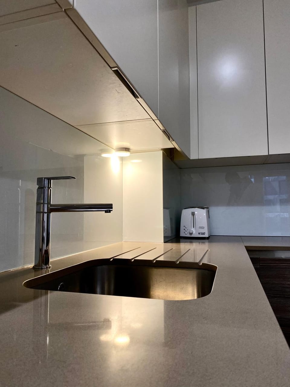 Kitchen or kitchenette, stove, toaster