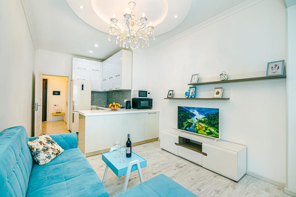 Kitchen or kitchenette, Living room, Seating area, stove