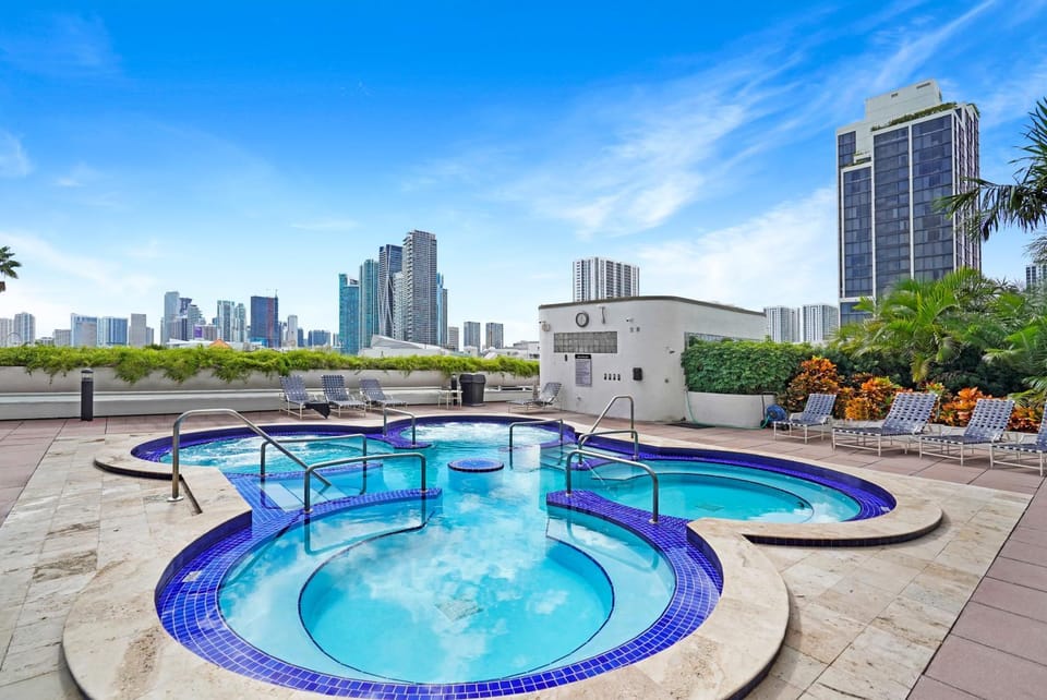 Property building, Hot Tub, City view, sunbed