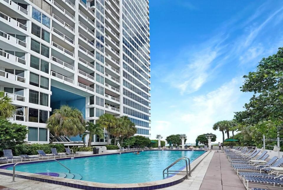 Property building, Pool view, Swimming pool, sunbed