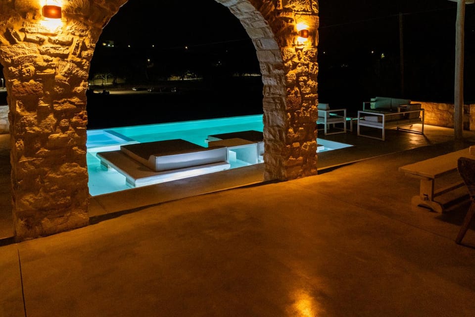 Patio, Night, Pool view, Swimming pool, sunbed