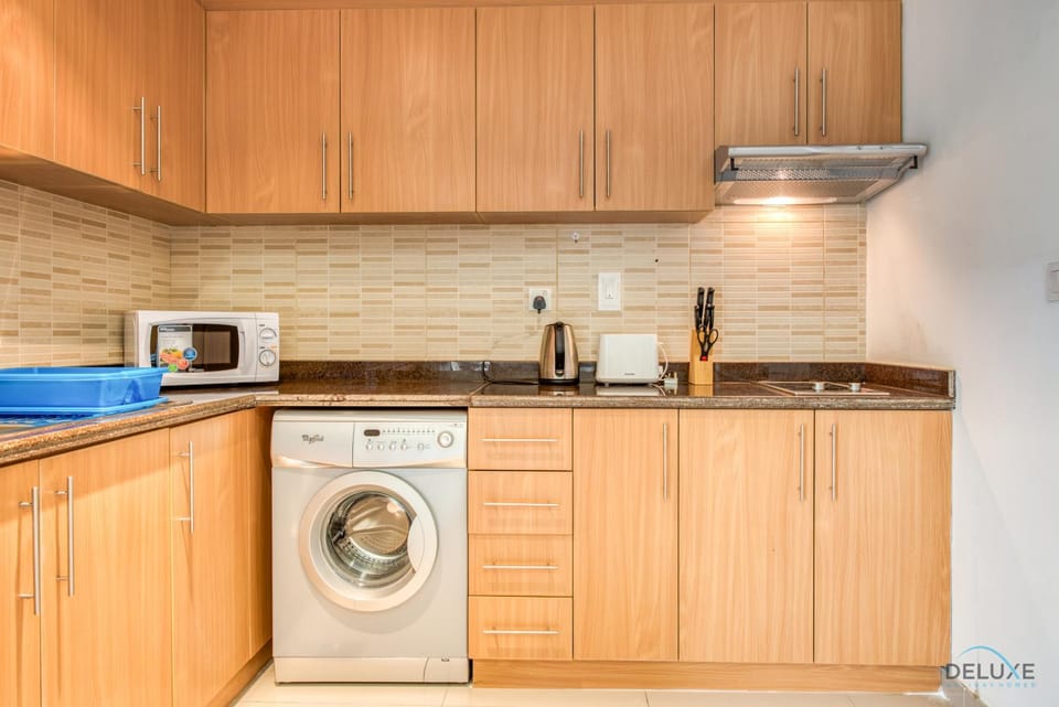 Kitchen or kitchenette, pet friendly, stove, toaster, washing machine