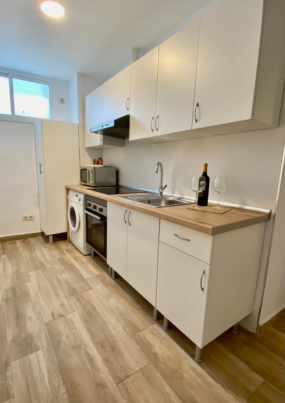 Kitchen or kitchenette, oven, stove