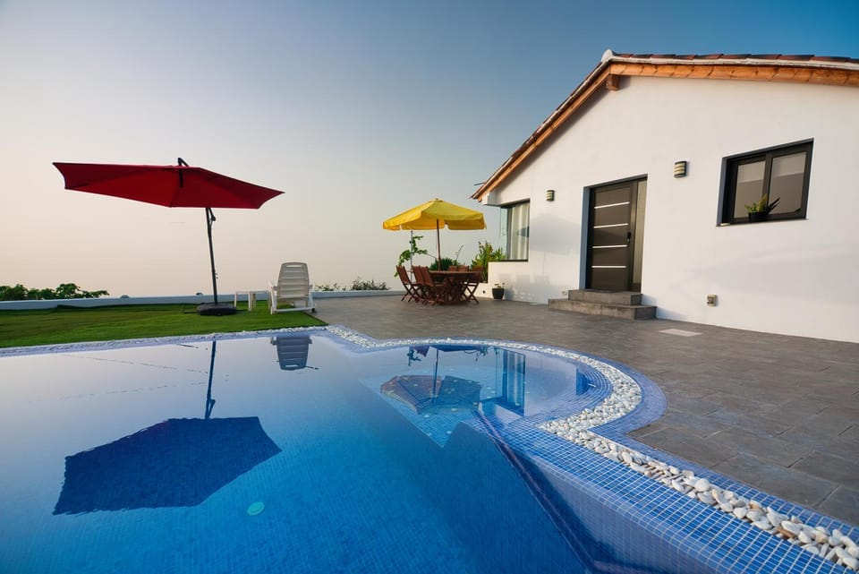 Property building, Patio, Swimming pool, sunbed