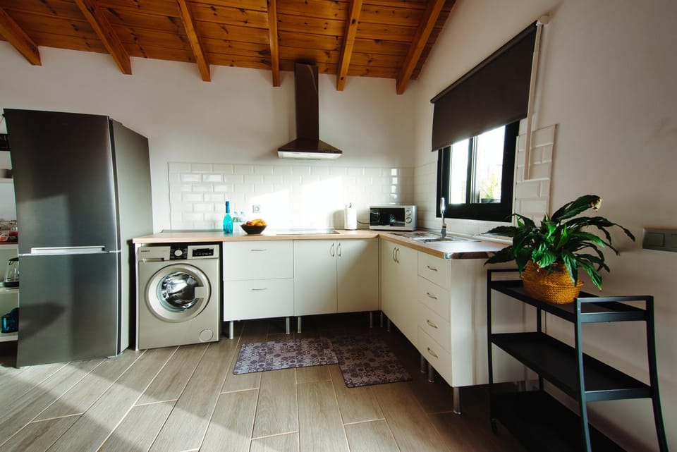 Kitchen or kitchenette, washing machine