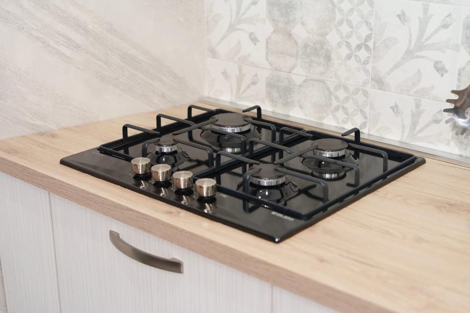 Kitchen or kitchenette, stove