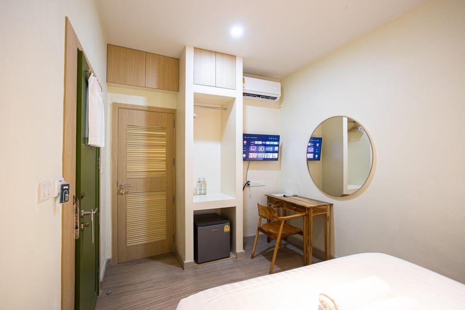 Bed, Photo of the whole room, hair dresser, wardrobe, air conditioner