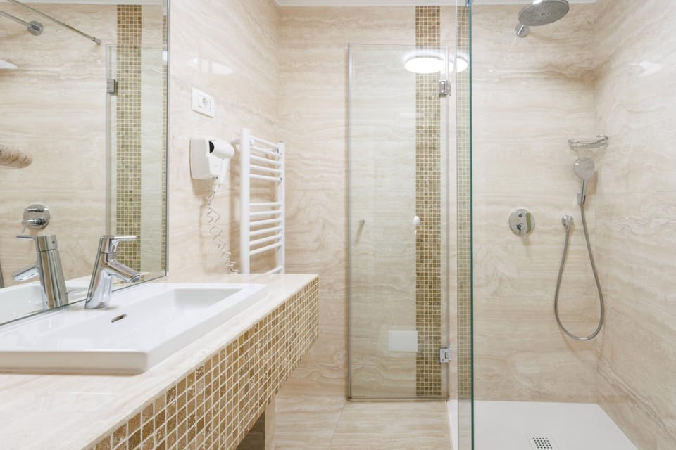 Shower, Bathroom, hair dryier, towels