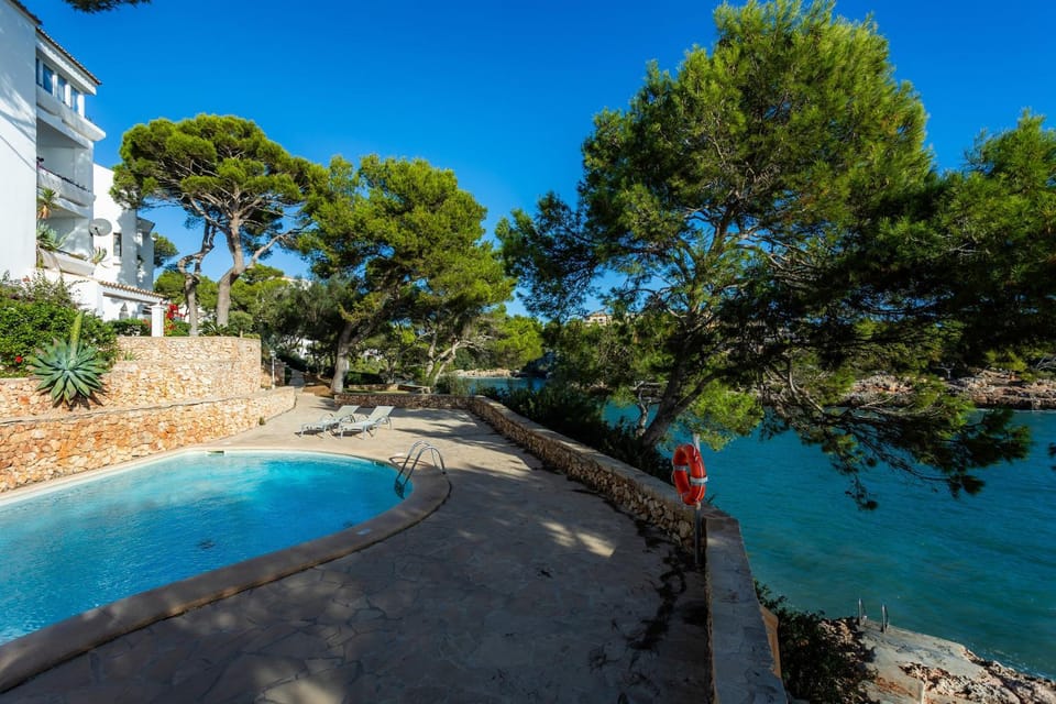 Property building, Living room, Swimming pool