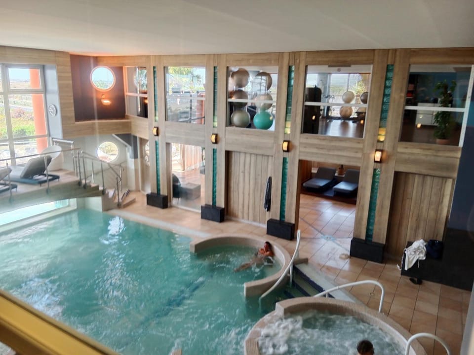 Property building, Living room, Swimming pool