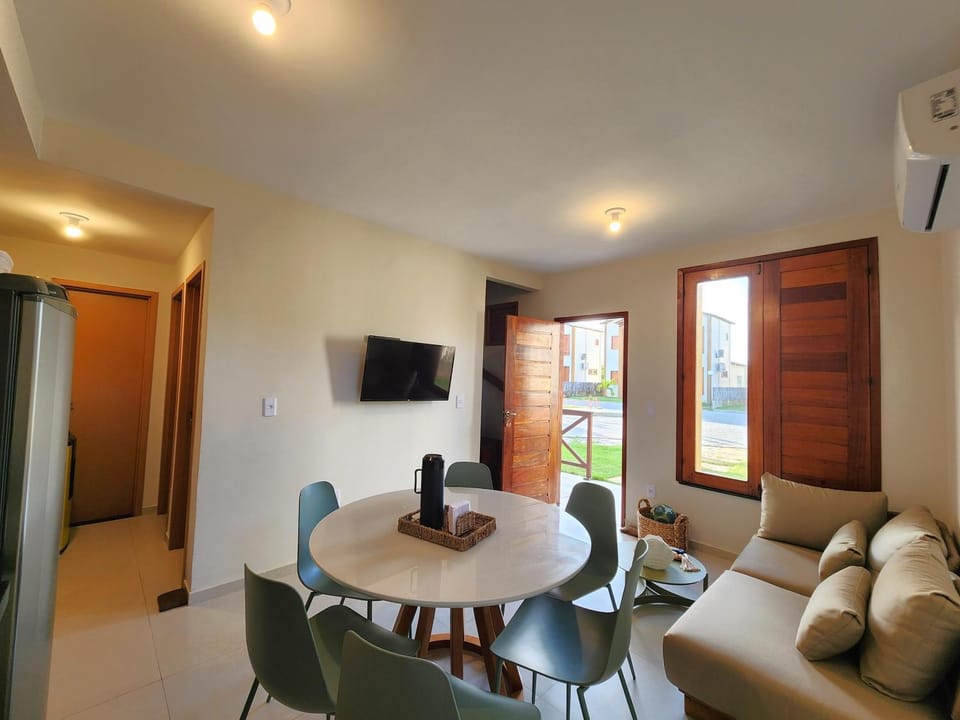 Communal lounge/ TV room, Living room, Seating area, Dining area, air conditioner