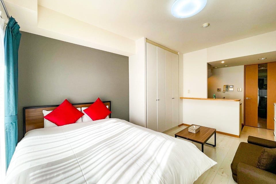 Bed, Living room, Seating area, Bedroom