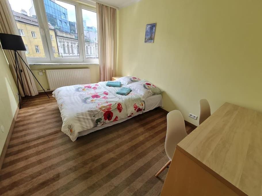 Bed, Photo of the whole room, hair dresser, towels