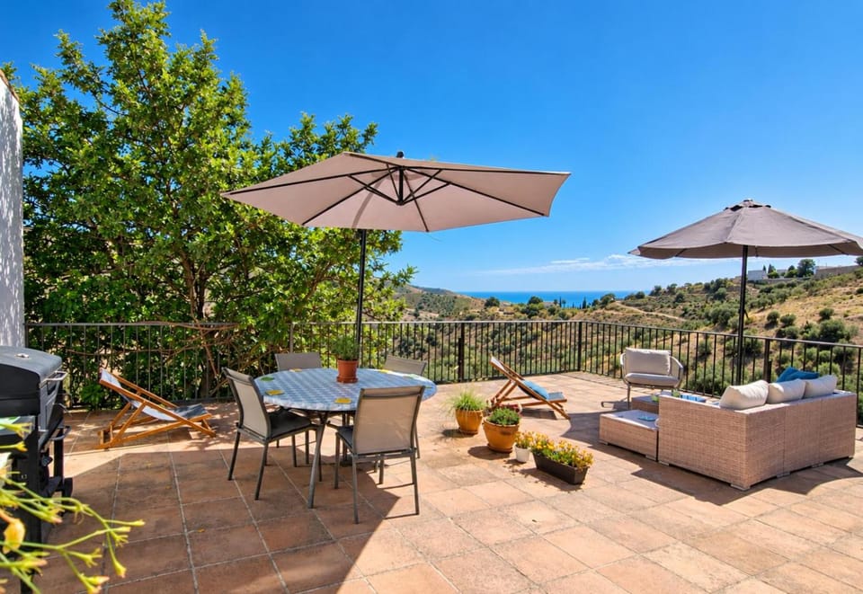 View (from property/room), Balcony/Terrace, Seating area, Mountain view, Sea view