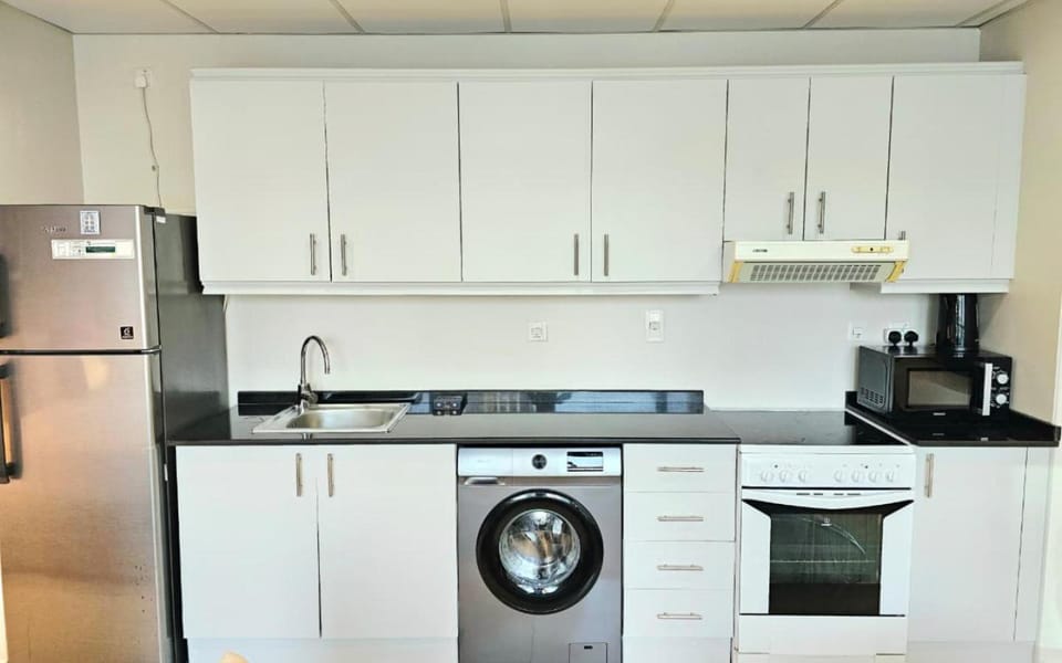 Kitchen or kitchenette, oven, stove