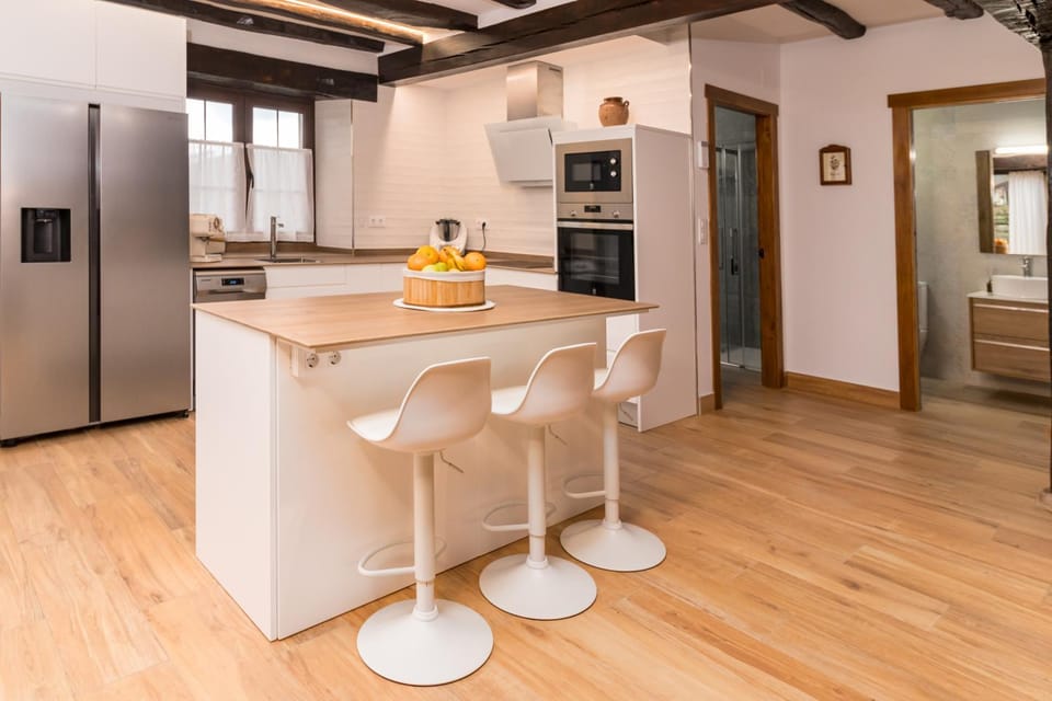 Kitchen or kitchenette, dishwasher, oven, stove