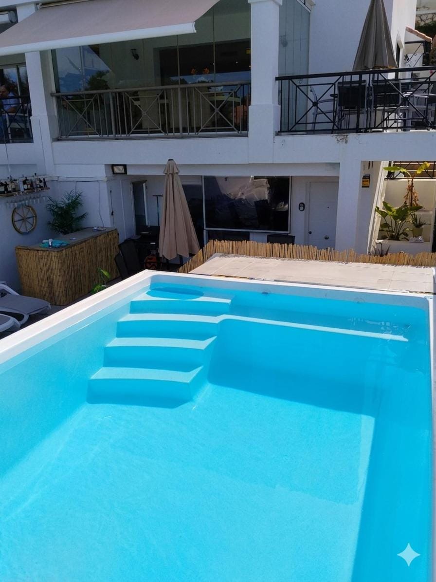 Property building, Day, View (from property/room), Balcony/Terrace, Pool view, Swimming pool