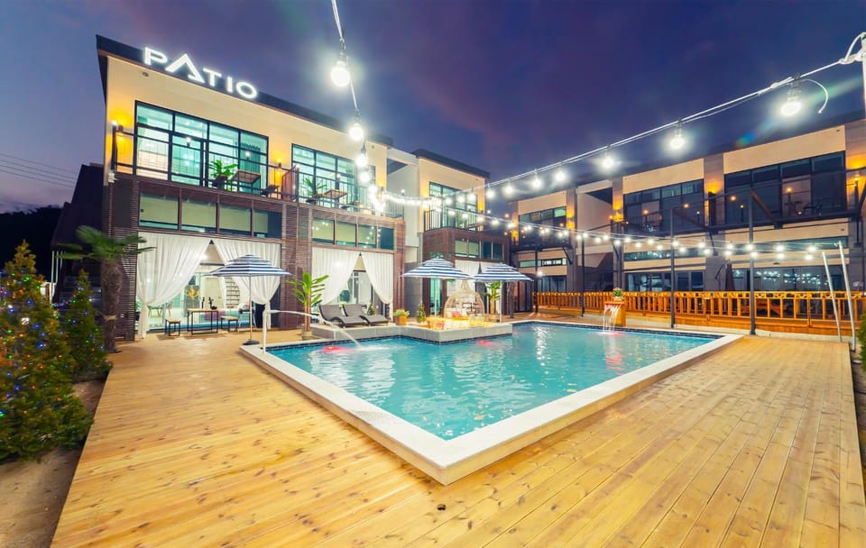 Property building, Night, Pool view, Swimming pool, sunbed