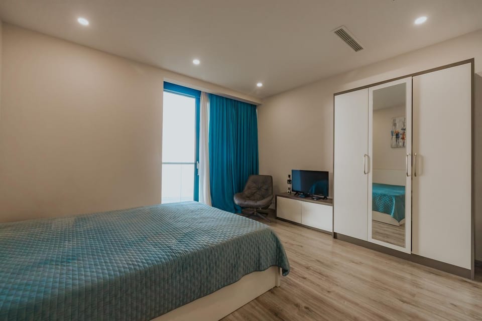 View (from property/room), Seating area, Bedroom, Sea view, wardrobe
