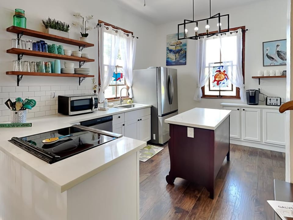 Kitchen or kitchenette, microwave, stove, kitchen