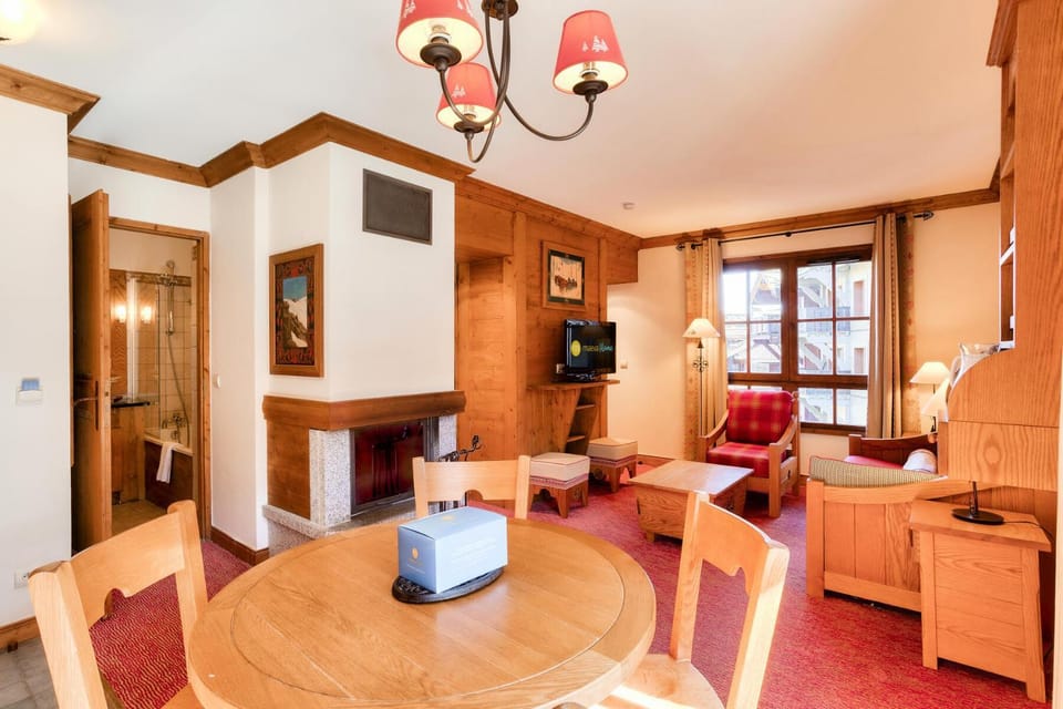 Bed, fireplace, kitchen