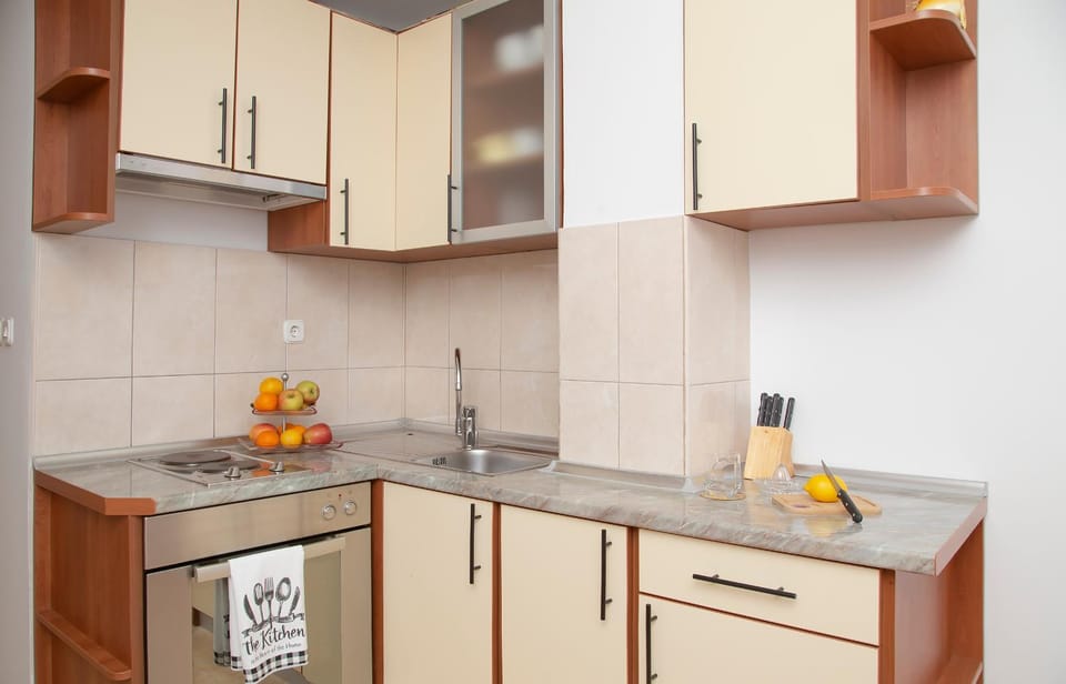 Kitchen or kitchenette, stove