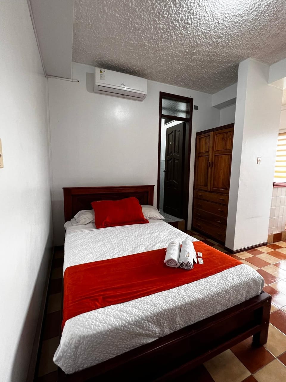 Bed, Photo of the whole room, towels, wardrobe, air conditioner