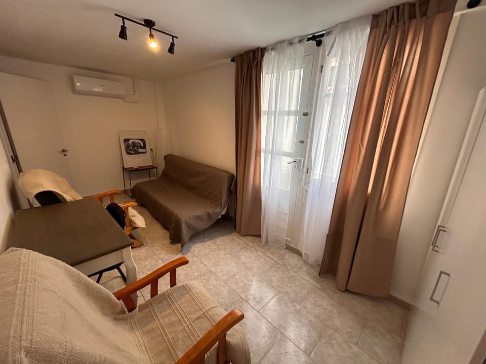 Bed, Living room, Seating area, Bedroom, air conditioner