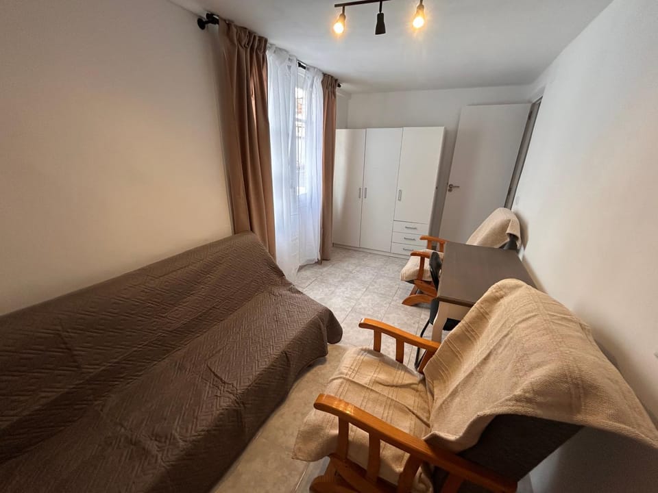 Bed, Seating area, Bedroom