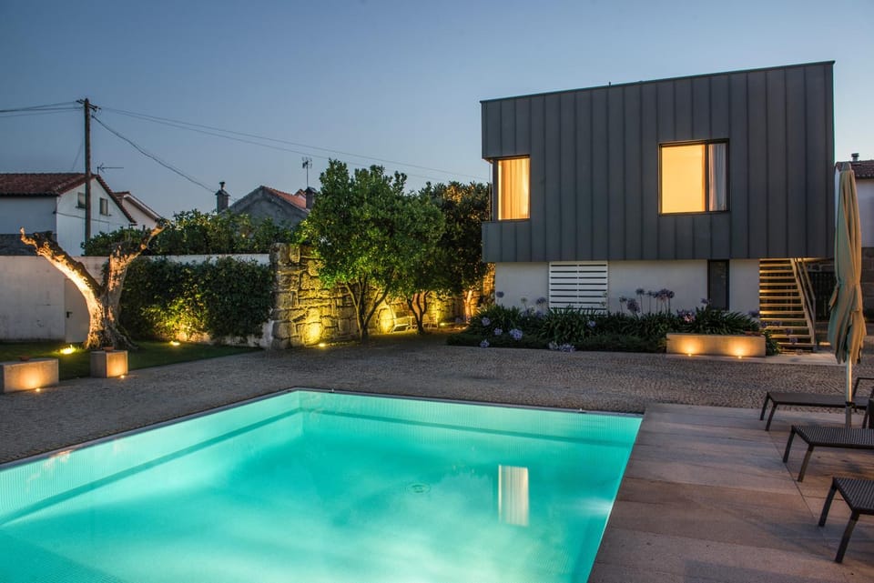 Property building, Patio, Night, Garden, Pool view, Swimming pool, sunbed