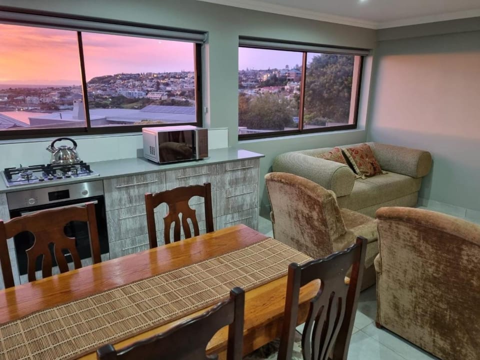 View (from property/room), Living room, Seating area, Dining area