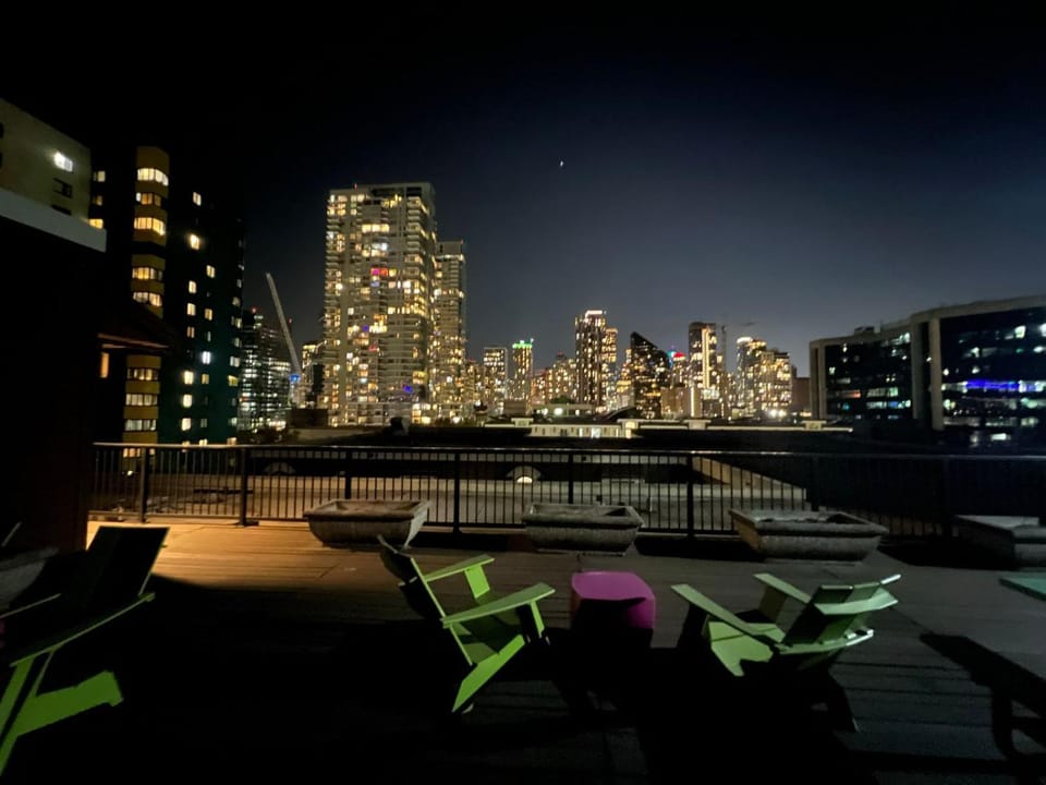 Property building, Night, View (from property/room), Balcony/Terrace, Seating area, City view