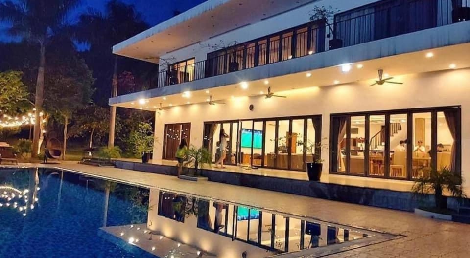 Property building, Night, Pool view, Swimming pool