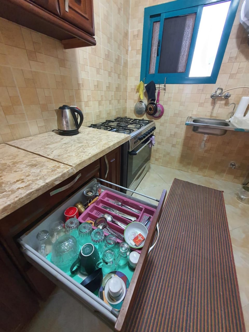 Kitchen or kitchenette, stove