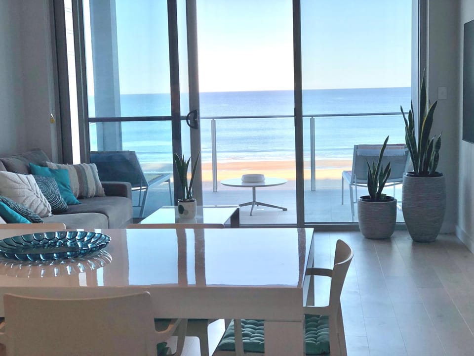 View (from property/room), Living room, Seating area, Dining area, Sea view