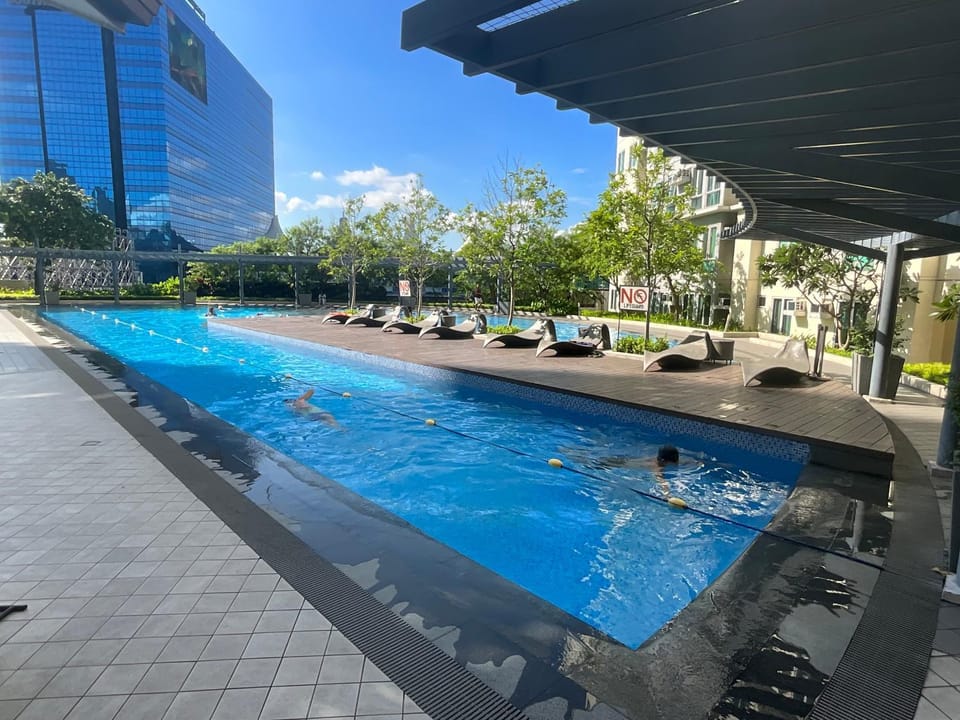 Property building, Pool view, Swimming pool, sunbed