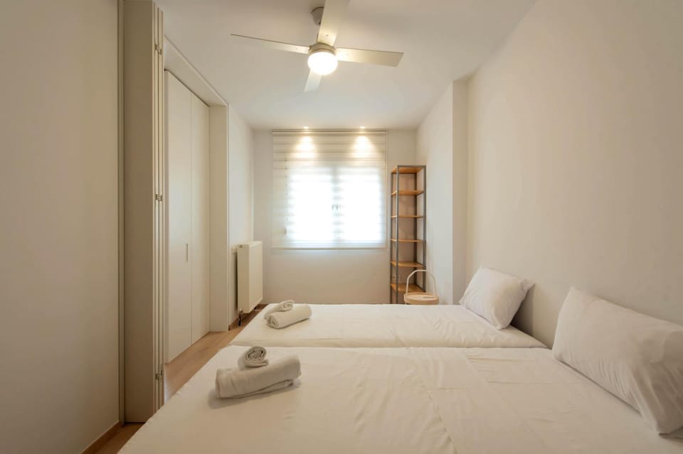 Bed, Bedroom, fireplace, towels