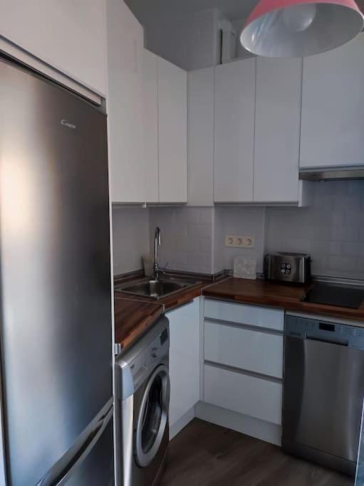 Kitchen or kitchenette, dishwasher, minibar, stove, toaster, washing machine