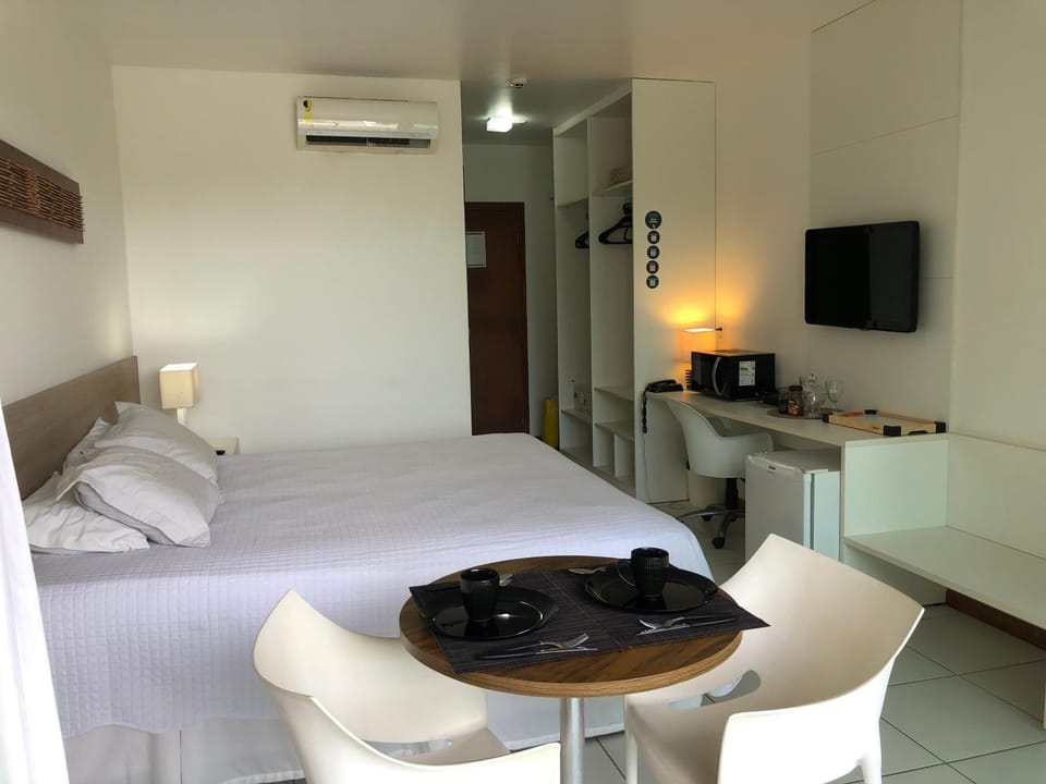 Bed, TV and multimedia, Dining area, minibar, air conditioner
