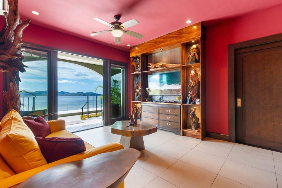 Luxury Condo with Panoramic Ocean Views, Sparkling Infinity Pool, and Modern Open-Concept Design House in Playa Flamingo