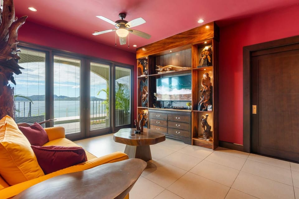 Luxury Condo with Panoramic Ocean Views, Sparkling Infinity Pool, and Modern Open-Concept Design House in Playa Flamingo