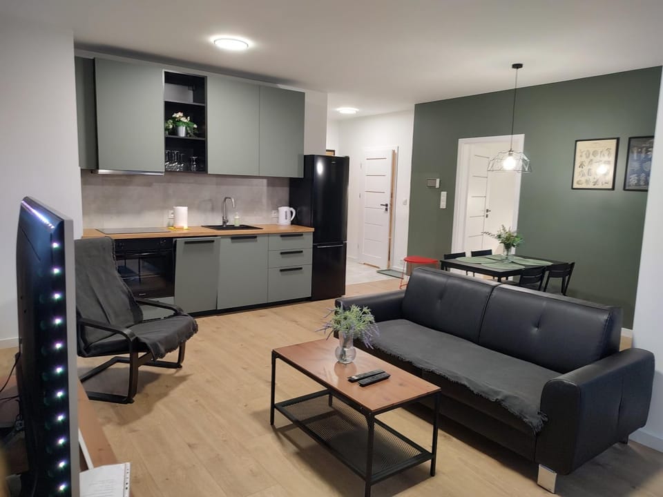 Kitchen or kitchenette, Living room, Seating area, Dining area