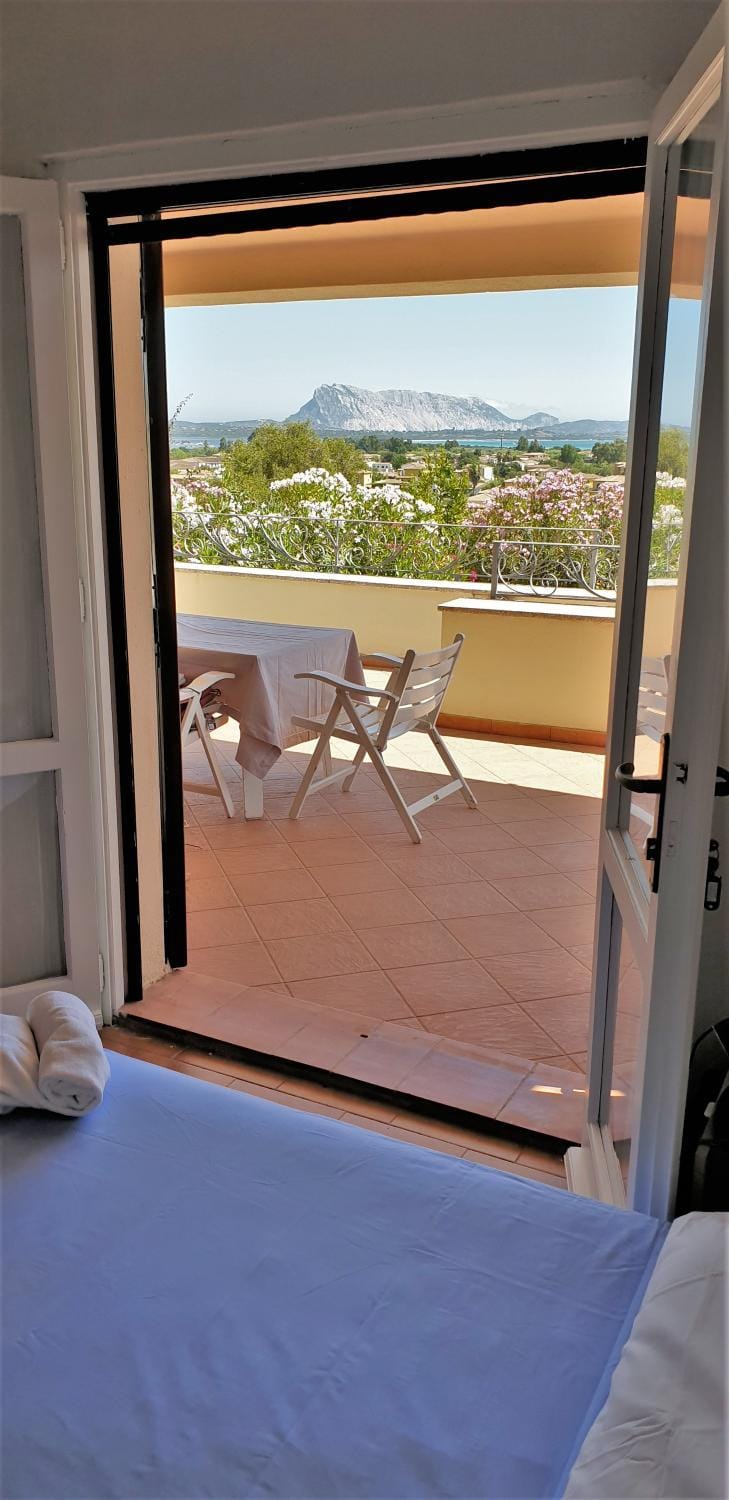 Patio, Bed, Natural landscape, Photo of the whole room, Bedroom, Sea view